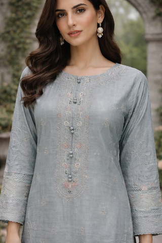 ladies grey trouser suit. close view without scarf