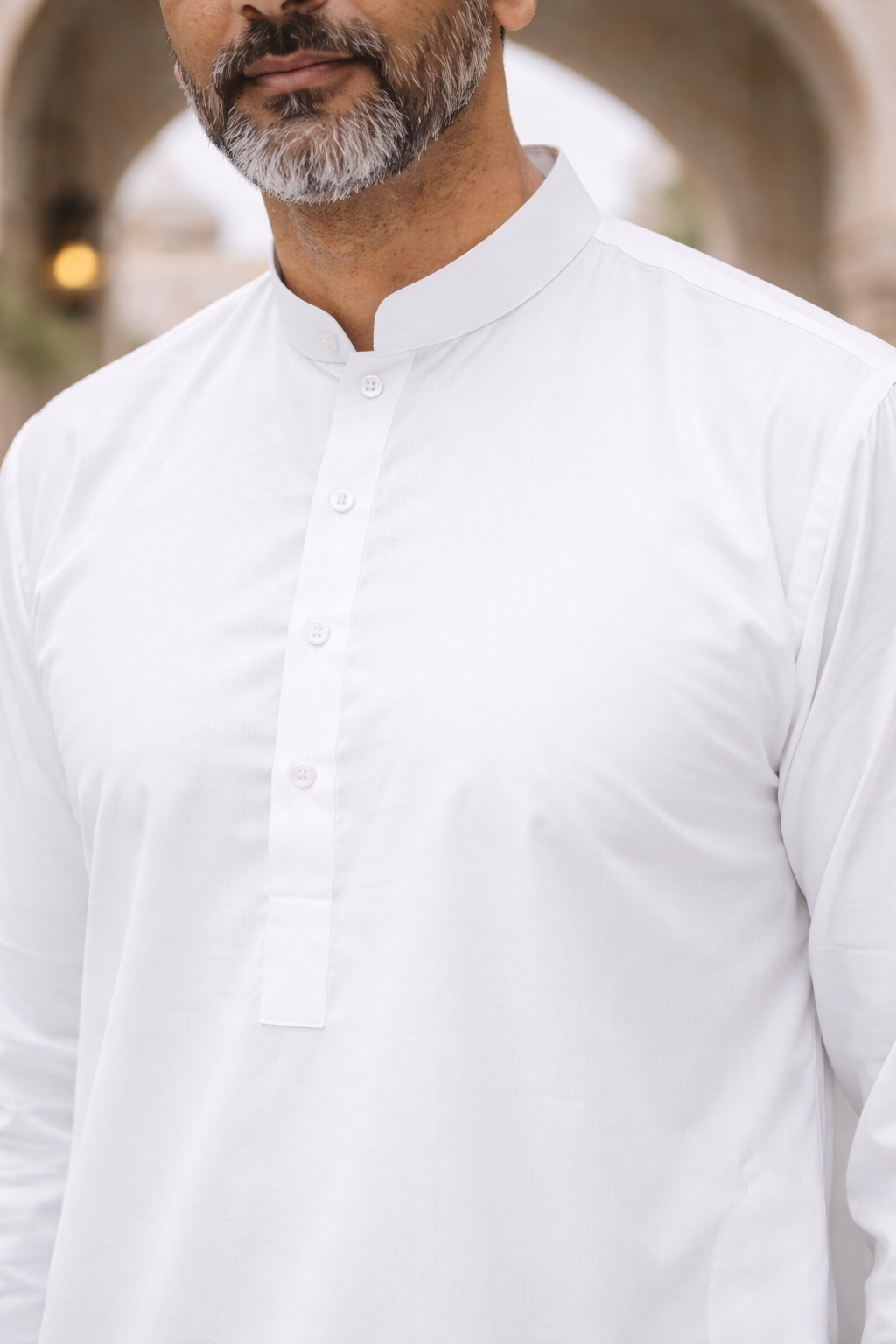 plain white mens pakistani shalwar kameez close up